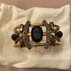 Costume cuff/bracelet - gold with black stones